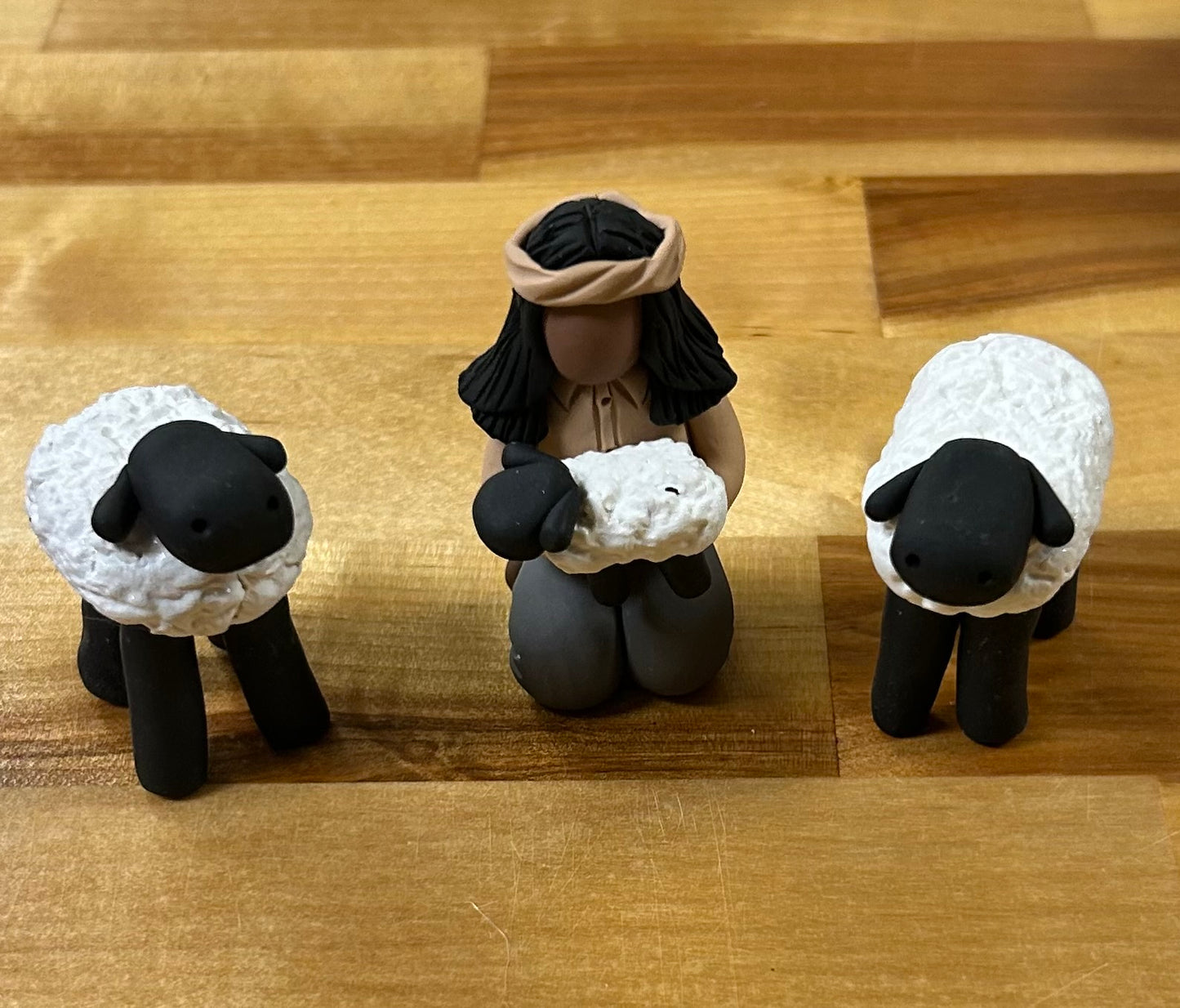 Shepherd & sheep/ JL